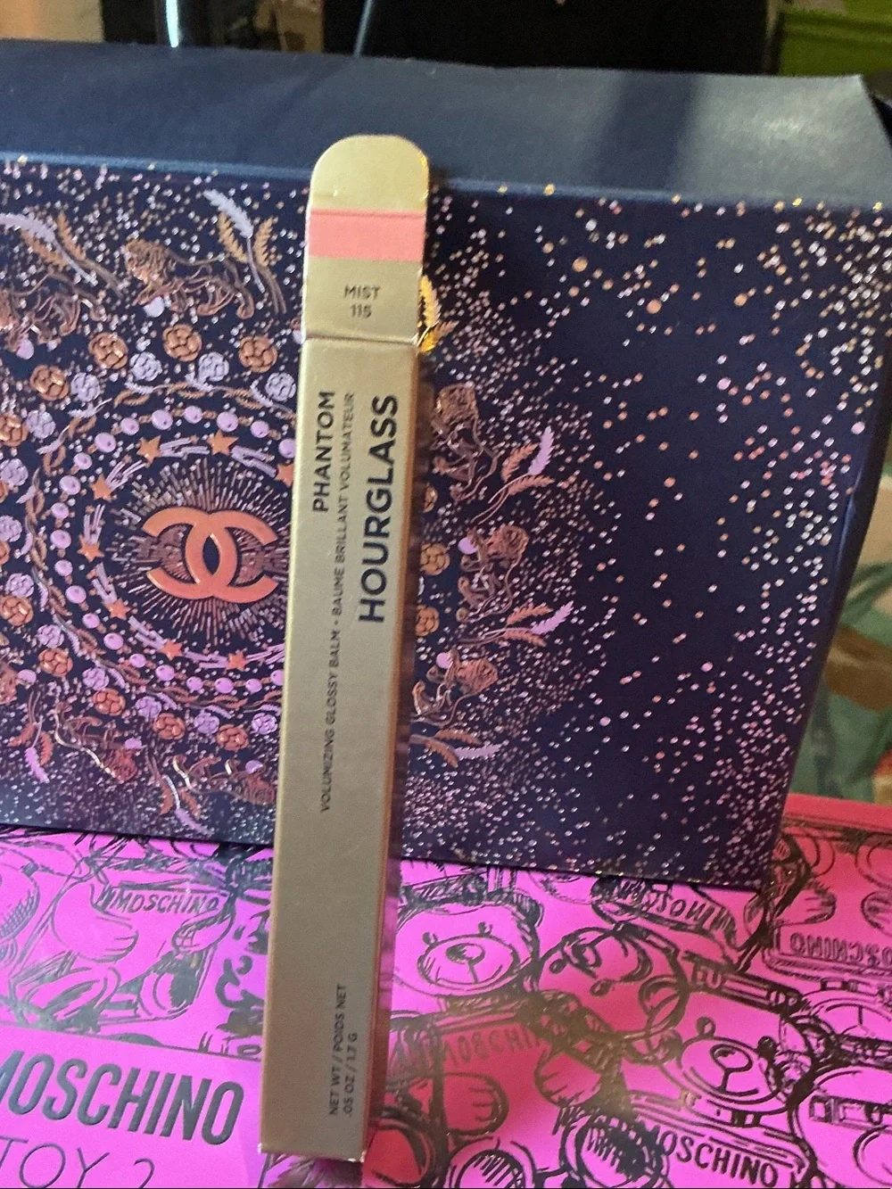 Hourglass Phanton Mist 115 Glossy Balm in Gold and Pink Accents